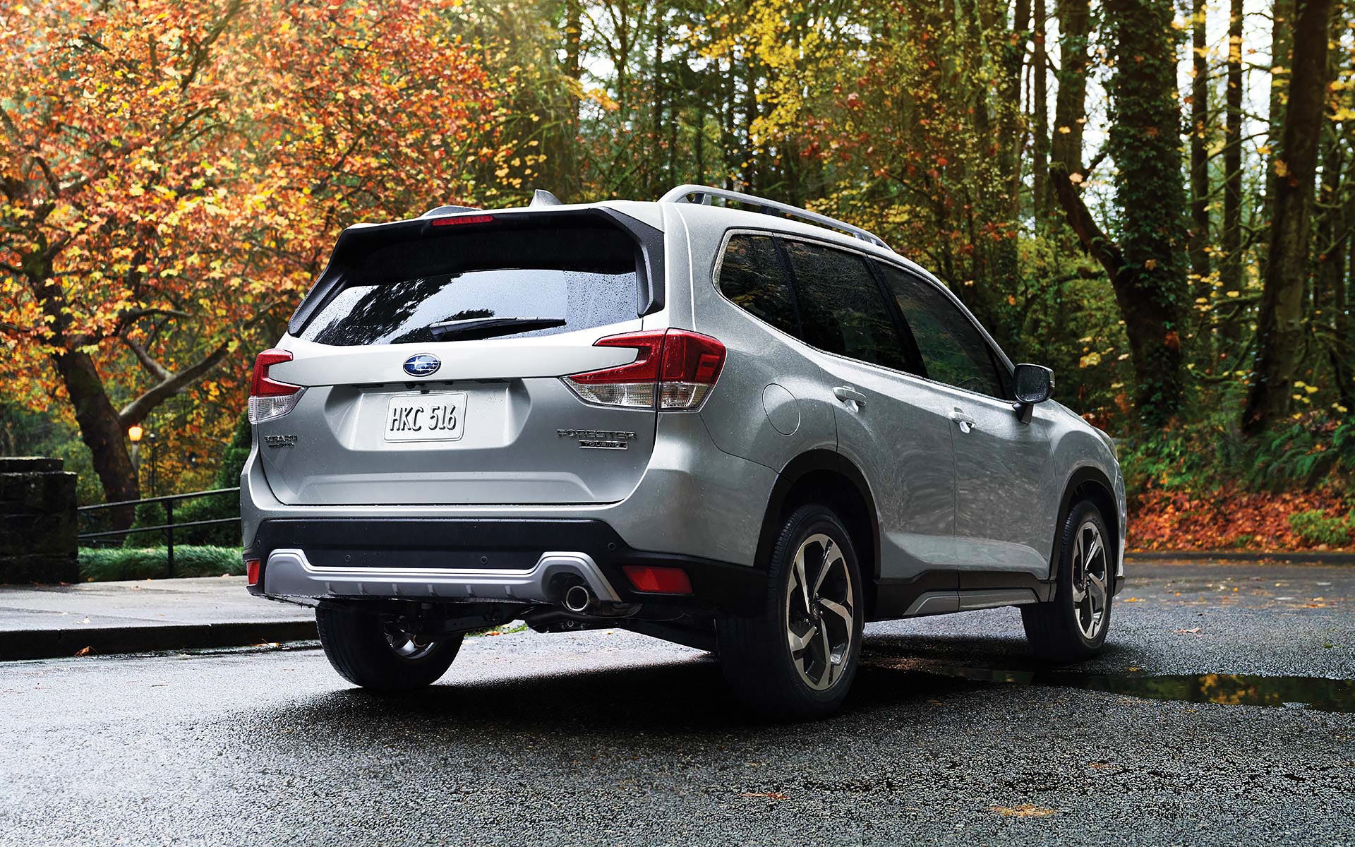 The rear of the 2022 Forester on a neighborhood street. | Five Star Subaru in Grapevine TX