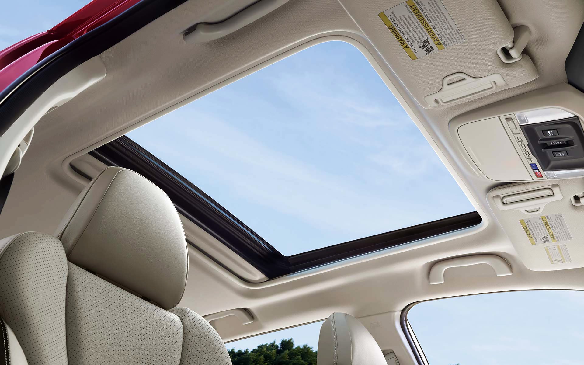 A view through the power sliding panoramic moonroof on the 2022 Forester Sport. | Five Star Subaru in Grapevine TX